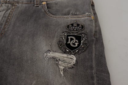 Dolce &amp; Gabbana – Jeans aus zerfetztem Baumwolldenim mit grauer Stickerei