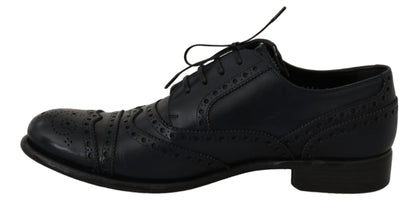 Dolce &amp; Gabbana Dunkelblaue Wingtip-Oxford-Kleiderschuhe aus Leder