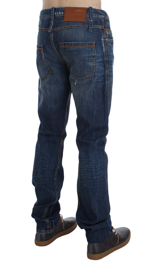 Acht Slim-Fit-Jeans aus Baumwolldenim in blauer Waschung