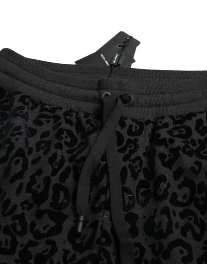 Dolce &amp; Gabbana Schwarze Slim-Fit-Jogginghose aus Baumwolle mit Leopardenmuster