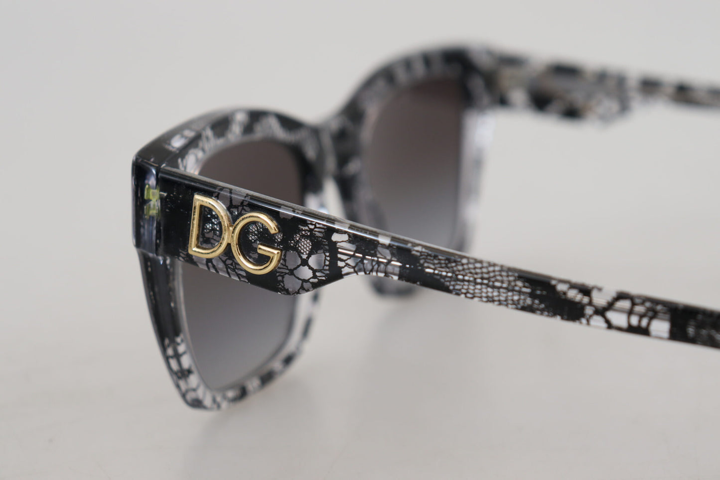 Dolce &amp; Gabbana Schwarze DG4384 Spitzen-Quadrat-Vollrand-Sonnenbrille aus Acetat