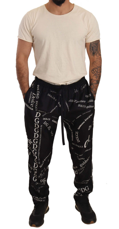 Dolce &amp; Gabbana Lounge-Jogginghose mit Logo-Print aus schwarzer Seide