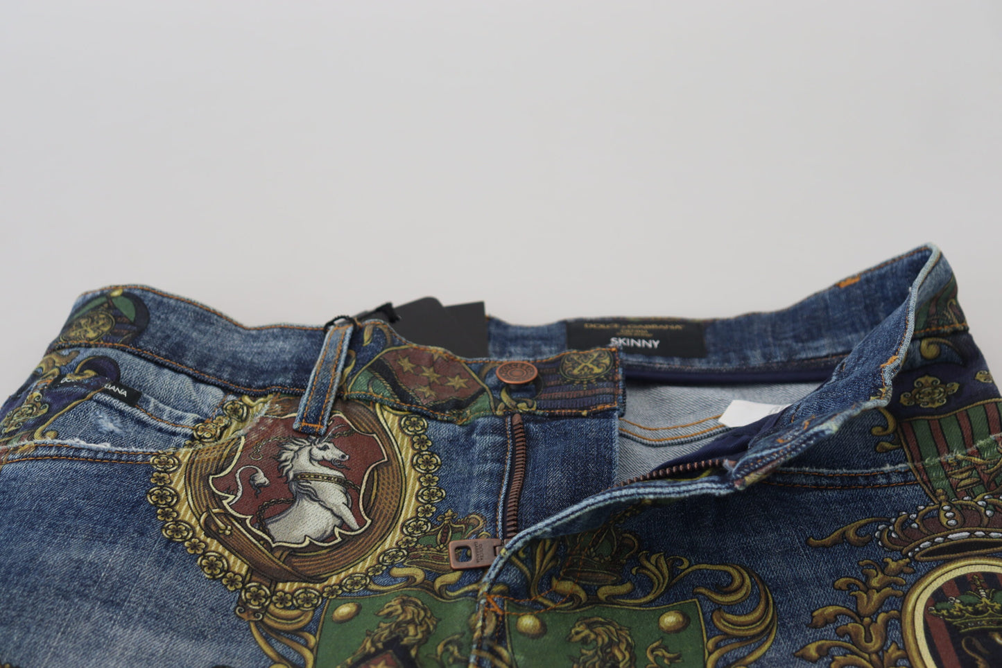 Dolce &amp; Gabbana Blaue Slim-Fit-Baumwolljeans mit Medal-Print