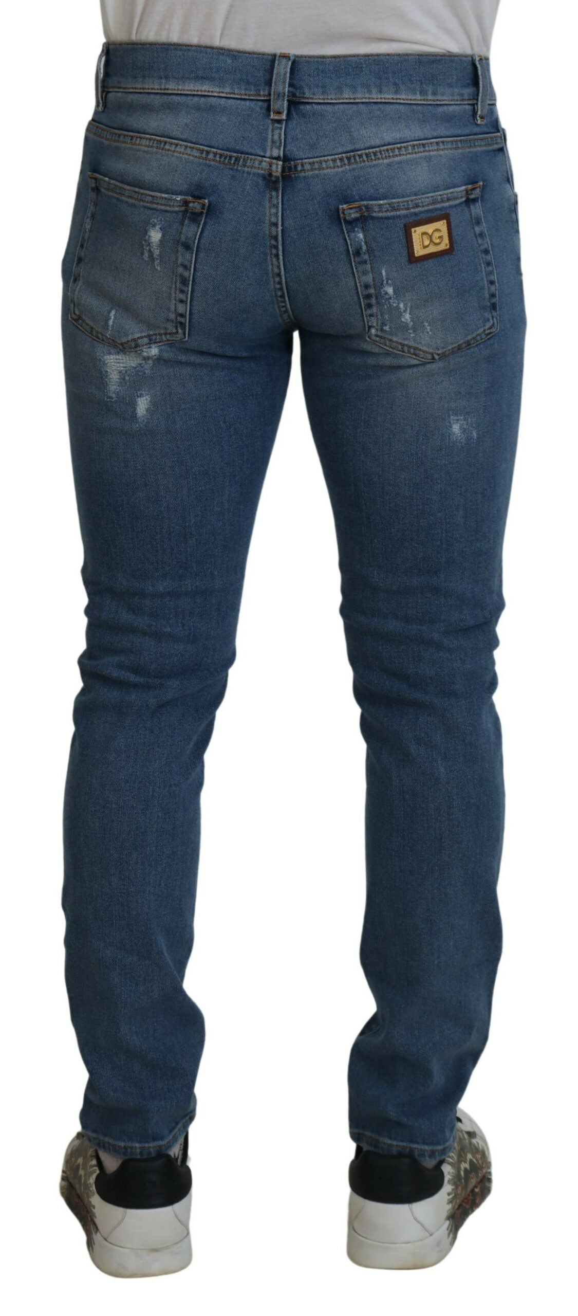 Blaue Slim-Fit-Jeans aus zerfetztem Baumwolldenim von Dolce &amp; Gabbana