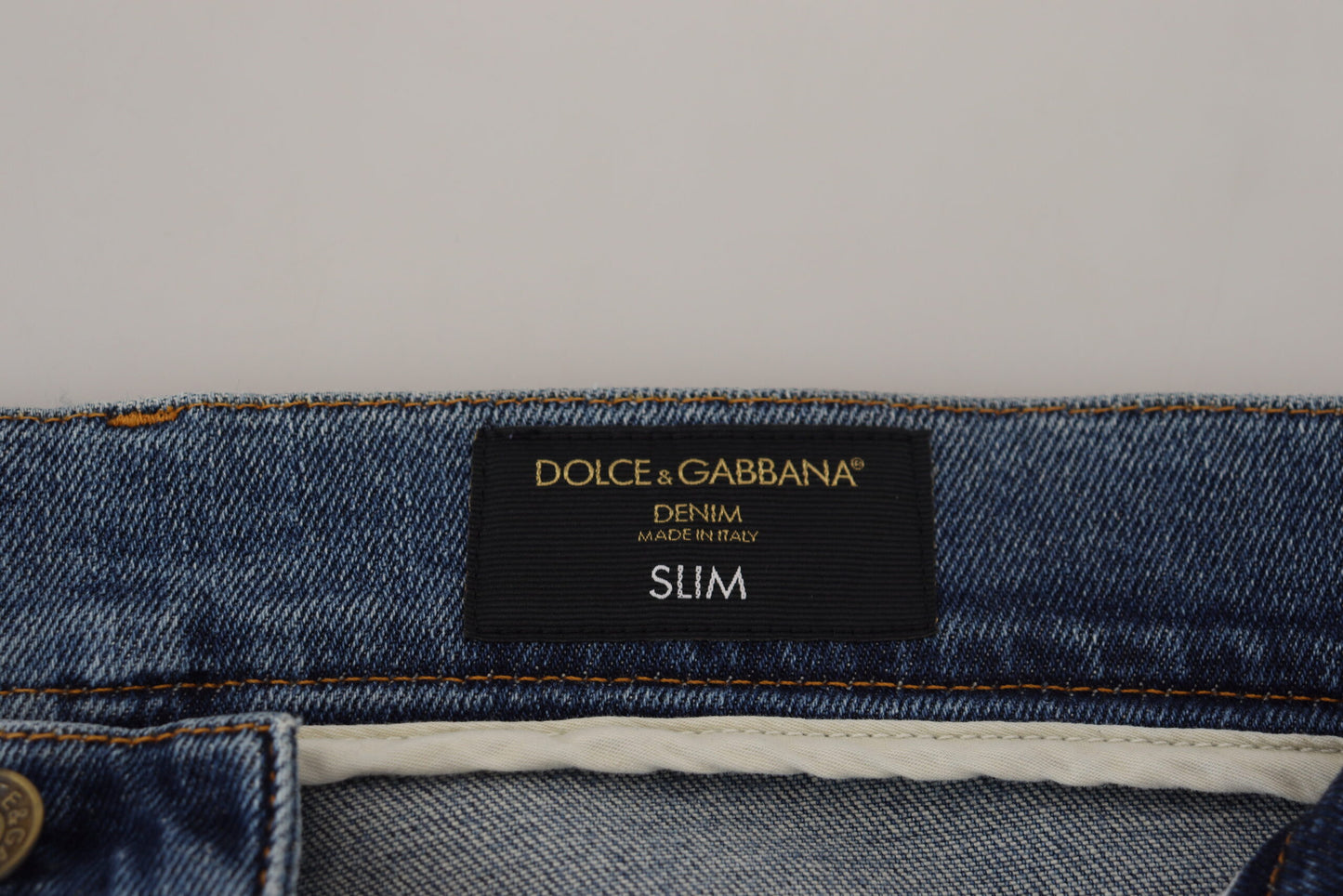 Blaue Slim-Fit-Jeans aus zerfetztem Baumwolldenim von Dolce &amp; Gabbana