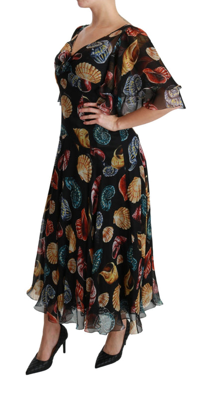 Dolce &amp; Gabbana Maxi-Midi-Seidenkleid in A-Linie mit schwarzen Muscheln